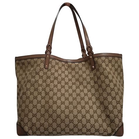 borsa gucci con teste di leone|Borse Gucci in Tela Beige .